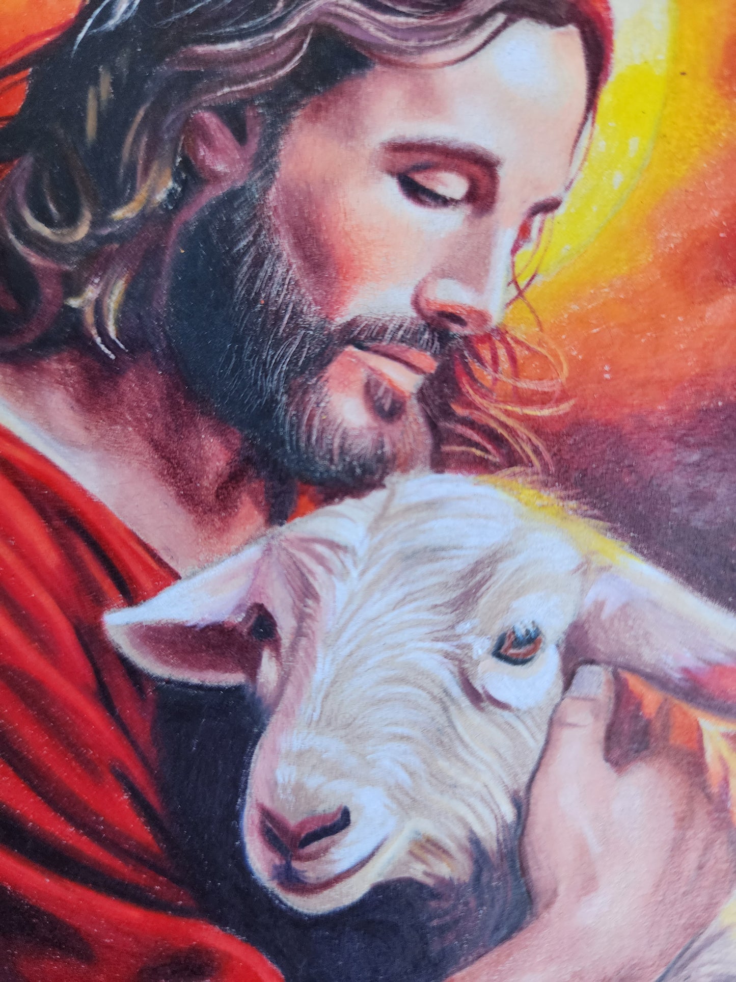 Jesus holding lamb